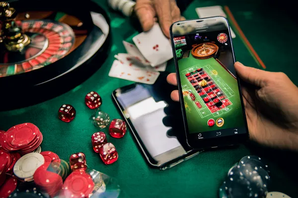 A person using their device against a moody casino-themed background, illustrating the smooth re-entry process at ZBZBET.
